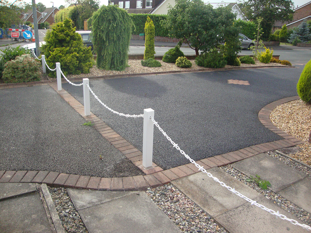 White Fence Post With White Chain and Diamond