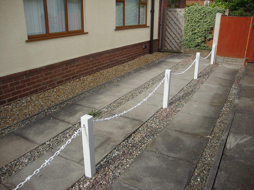 White Fence Post With White Chain and Diamond