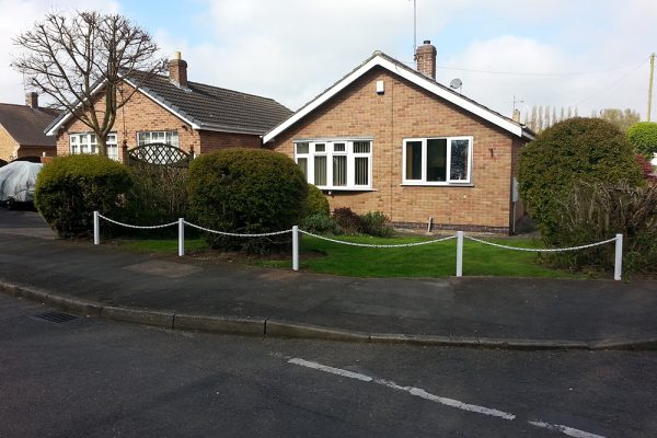 White UPVC Fence Posts with White Chains Garden Border White UPVC Fence Posts with White Chains Garden Border